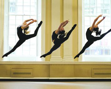 Dancers in the window at 140 William Street.