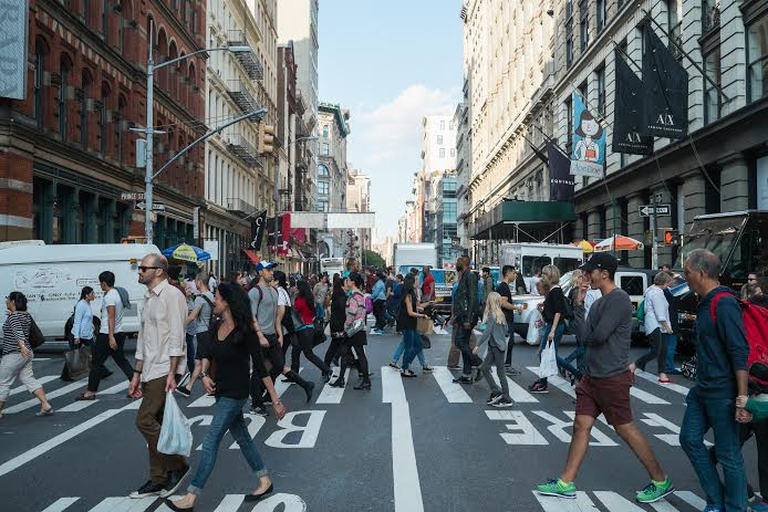 Crowds of people in Soho.