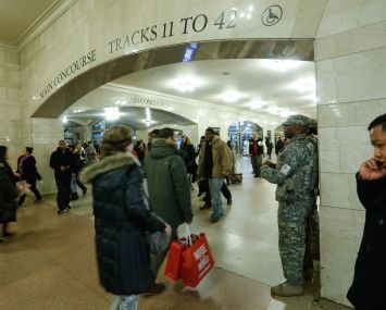 Military officers guard Grand Central Terminal, a potential terrorist target. (Photo by Cem Ozdel/Anadolu Agency/Getty Images)