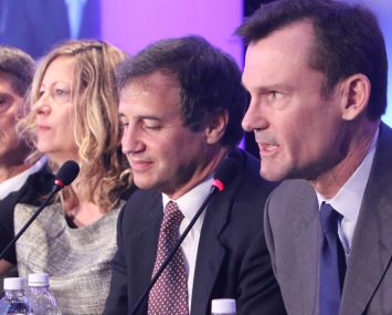 A group of panelists speak at CREFC.