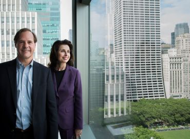 Tommy Craig and Mary Ann in front the 10th floor view from 7 Bryant Park (Photo: Sasha Mazlov/For Commercial Observer).