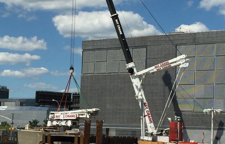 Apparently, this is the kind of project where the cranes need to lift other cranes.
