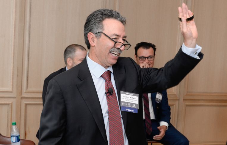 Moderator Jonathan Mechanic was given a bracelet that read "No sleep til Brooklyn," a gift from Forest City Ratner Companies CEO MaryAnne Gilmartin.