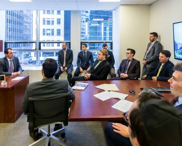 Brian Flax, left, and a team of his associates (Photo Courtesy: Meridian).