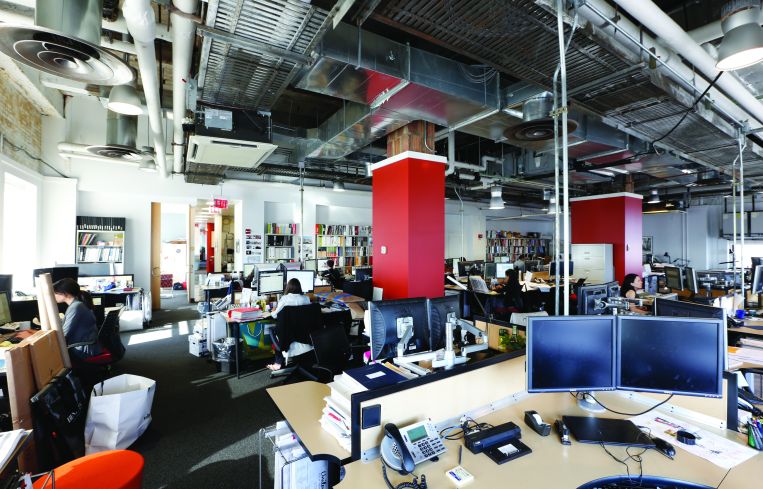 Existing workstations at Corgan's office (Photo: Corgan).