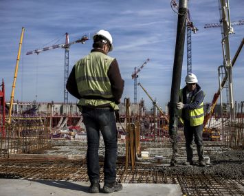 Construction workers. Photo: Jeff Pachoud for AFP/Getty Images