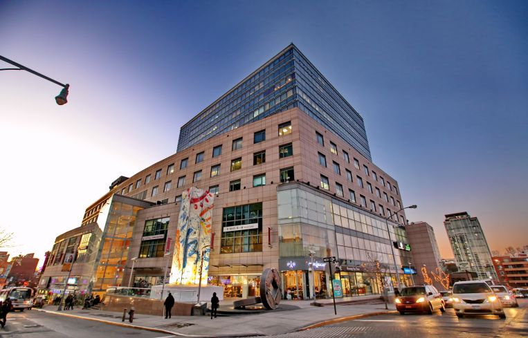 Messrs. Lee and Chiu built Flushing's first Class A building, Queens Crossing, at 136-20 38th Avenue (Photo: F & T Group).