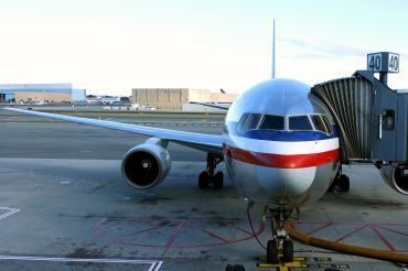 American Airlines is looking to refinance close to $900 million in bonds for Terminal 8. 