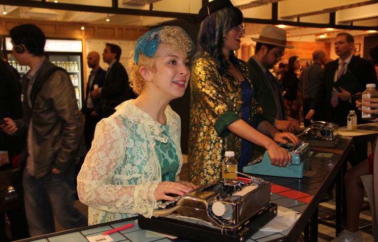 Three people typed up free haikus for the grand opening of TurnStyle (Photo: Lauren Elkies Schram/ for Commercial Observer).