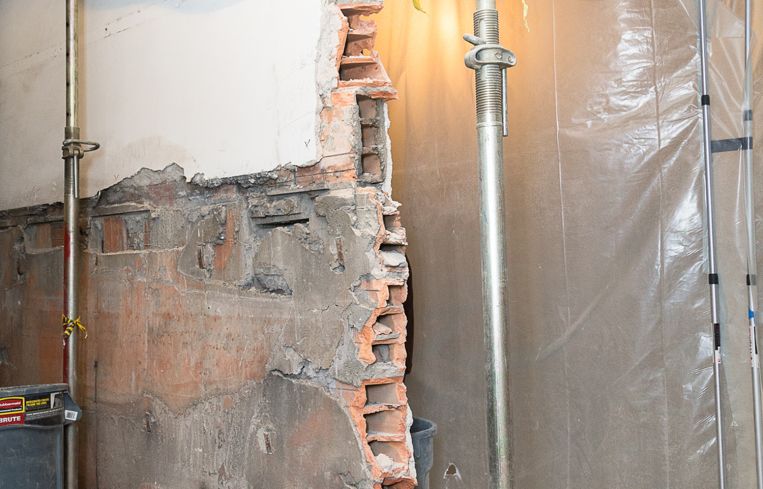 Workers are knocking down a wall where the new, larger lobby will be (Photo: Kaitlyn Flannagan/ For Commercial Observer).