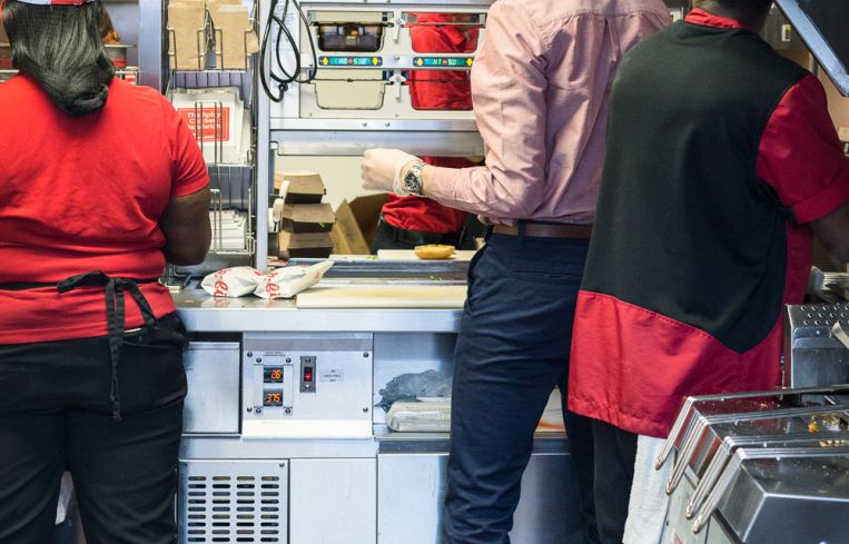 Employees working in the kitchen at Chick-fil-A at 1000 Avenue of the Americas (Photo: Kaitlyn Flannagan/Commercial Observer).