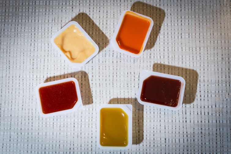 Five Chick-fil-A dipping sauces (Photo: Kaitlyn Flannagan/Commercial Observer).