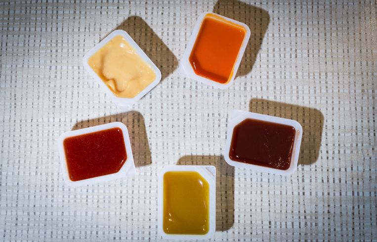 Five Chick-fil-A dipping sauces (Photo: Kaitlyn Flannagan/Commercial Observer).