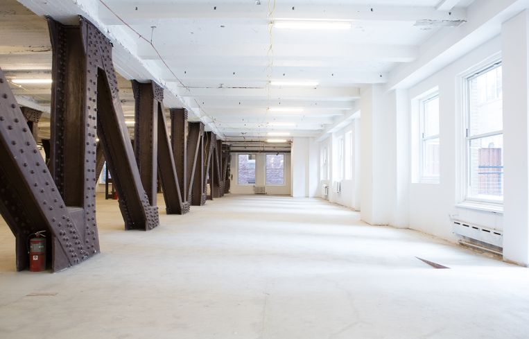Uncovered steel columns on the 10th floor next to open space (Photo: Sam Ortiz/ For Commercial Observer).