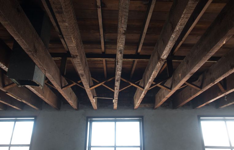Landlord Bushwack Capital will leave the exposed wood ceilings on the second floor (Photo: Aaron Adler/ for Commercial Observer).
