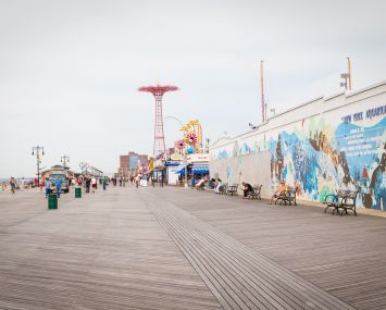 Coney Island boardwalk, which features the landmarked Parachute Jump.