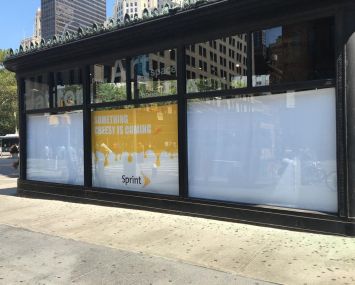 Flatiron Building at 175 Fifth Avenue, with "Something Cheesy Is Coming" signage concealing the Cheddar studio (Photo: Cheddar).