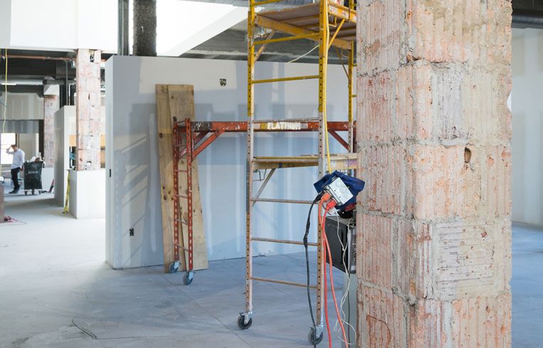 The office's columns were stripped revealing terra-cotta-covered steel beams (Photo: Kaitlyn Flannagan/ For Commercial Observer).