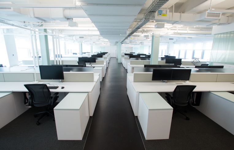 The open floor plan and the strategically located glass-walled conference room give the space a light airy feel at the new ESRT offices at 111 W33rd St. Photo: Aaron Adler/ for The Commercial Observer.