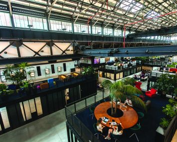 A view of the communal work and meeeting spaces at New Lab in Brooklyn. Photo: Emily Assiran/Commercial Observer