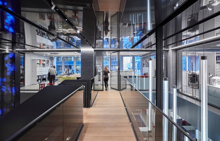 There are wood floors and mirrors incorporated in the office build-out. Photo: Gensler.
