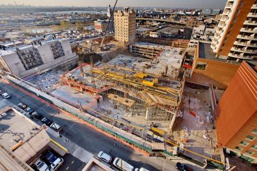 F&T Group's Tangram project, a 1.2-million-square-foot development in Flushing under construction, will bring the neighborhood's first movie theater in three decades in a 225,000-square-foot retail podium. Photo: F&T Group. 