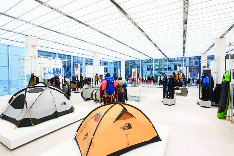 Jackets and tents in the new store. Photo by Eugene Gologursky/Getty Images for The North Face.