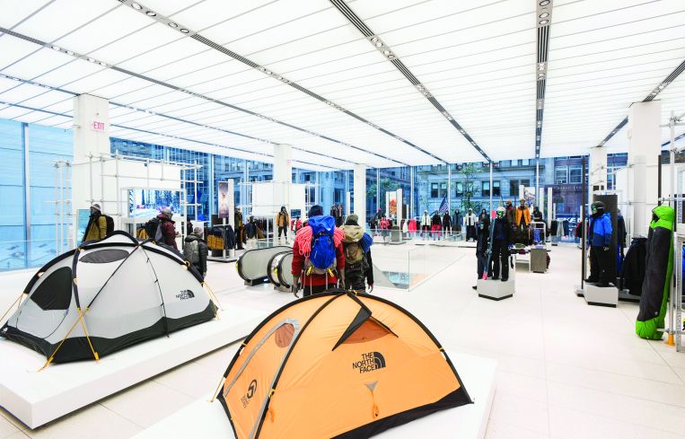 Jackets and tents in the new store. Photo by Eugene Gologursky/Getty Images for The North Face.