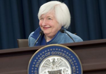 Federal Reserve Chair Janet Yellen speaks during a press conference following the announcement that the Fed will raise interest rates, in Washington, D.C., today. Photo: SAUL LOEB/AFP/Getty Images