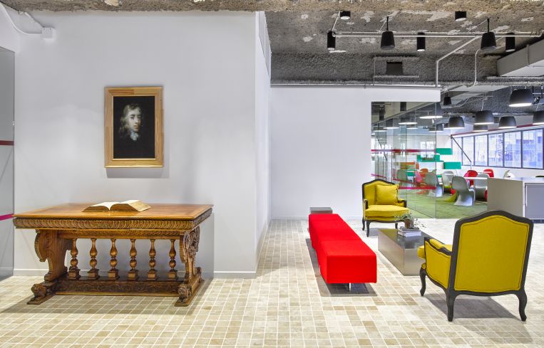 Antique-styled furniture in the offices helps the university press connect to its roots. Photo: Garrett Rowland.