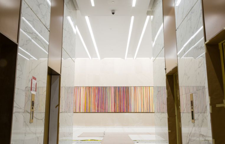 The lobby was one of the first things RXR tackled. It has marble and limestone walls and unique art work. Photo: Melissa Goodwin/For Commercial Observer.
