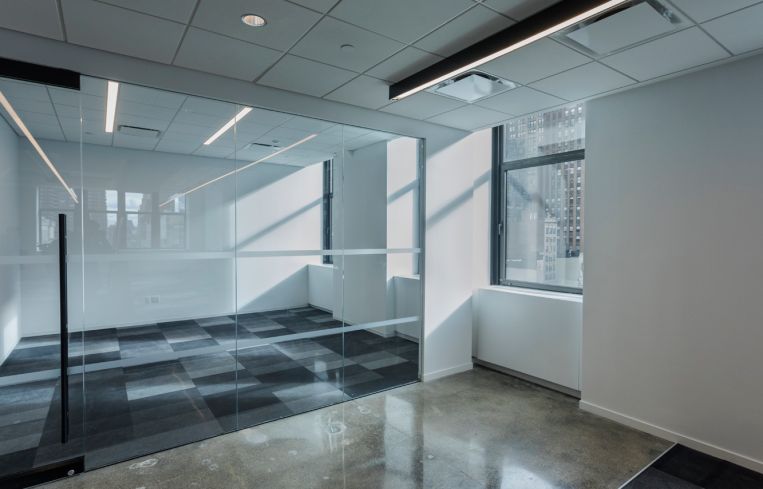 Private glassed offices only makeup about 4 percent of the office at 5 Penn Plaza. Photo: Sasha Maslov/For Commercial Observer