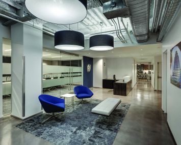 PJ Mechanical's office with exposed ductwork.