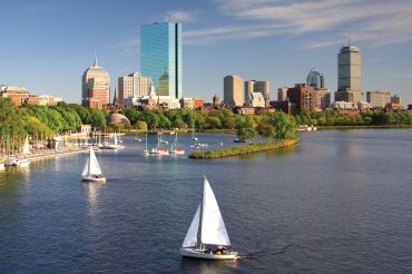 Sailboats on the Charles River with Boston's Back Bay skyline in the background. Photo: Getty Images