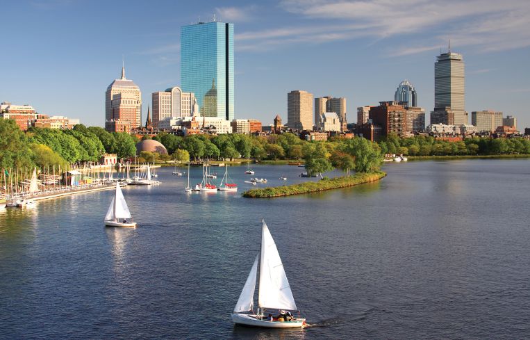 Sailboats on the Charles River with Boston's Back Bay skyline in the background. Photo: Getty Images