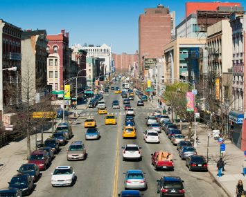 Looking west on Harlem's 125th Street from the Metro North station. Photo: Getty Images.