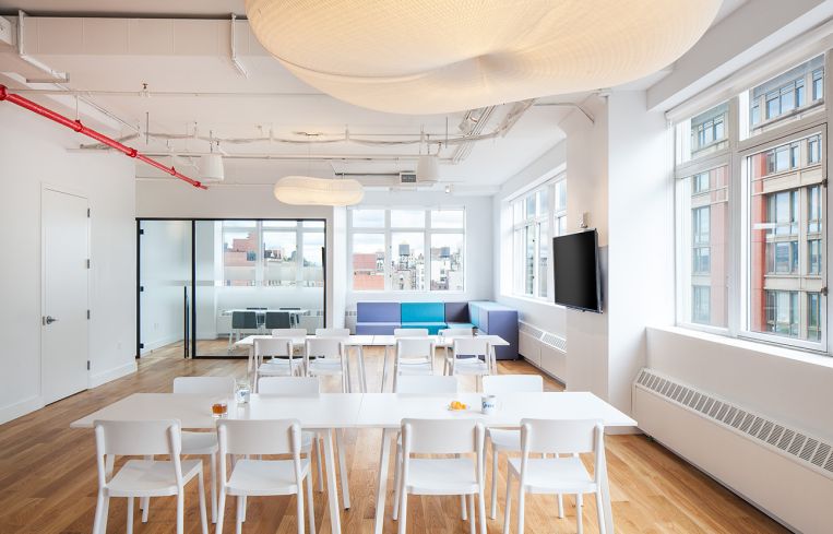 Wood floors grace the 12th floor over the brick ones on the sixth floor. Image: JIDK