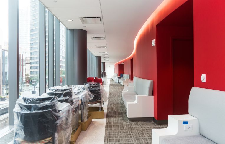 Red exterior hallways at the new Brooklyn Health Center. Photo: Emily Assiran/For Commercial Observer