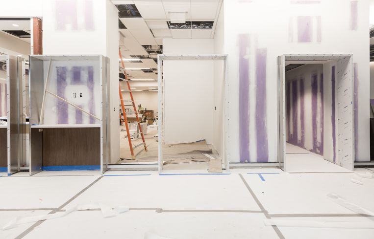 The under-construction lobby and pharmacy at 620 Fulton Street. Photo: Emily Assiran/For Commercial Observer