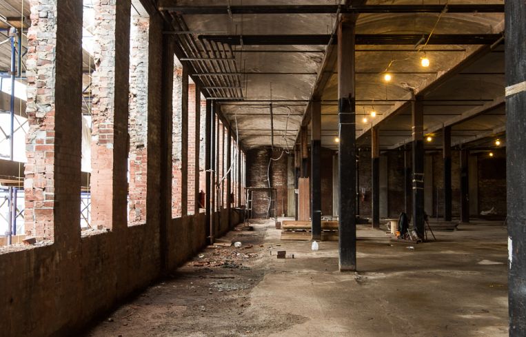 The window openings at 20 Bruckner were lengthen. Photo: Emily Assiran/For Commercial Observer