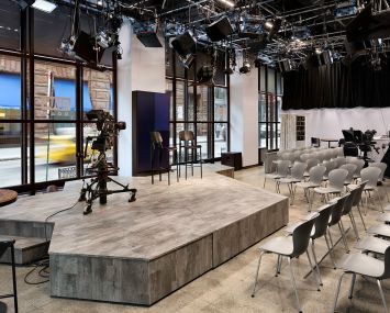 Oath's studio has a moveable and expandable platform and a lighting grid system.