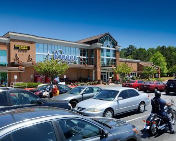 Kroger is trying to compete against Amazon and Whole Foods by building robotic warehouses for its online grocery delivery service.
