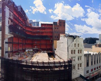 An opening in the 1920s existing Macy's building which will be connected to the new 10-story office structure. Together the old and new will have 620,000 square feet of office space.