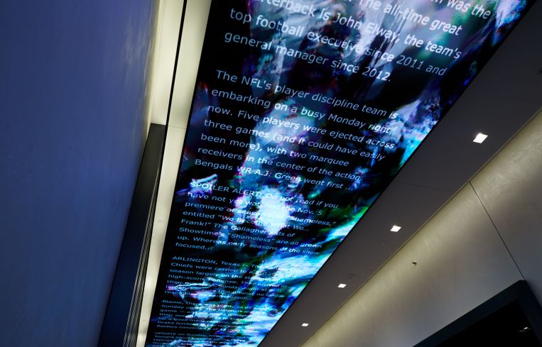 News alerts on the video screen.