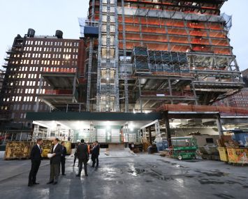 Executives from EY and Brookfield Property Partners tour Brookfield’s 1 Manhattan West on Wednesday.