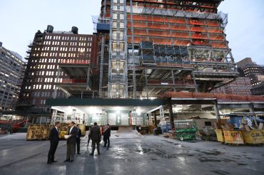 Executives from EY and Brookfield Property Partners tour Brookfield’s 1 Manhattan West on Wednesday.