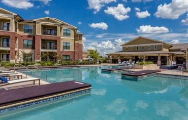 The swimming pool and two buildings at the Parkside Place development near Houston.