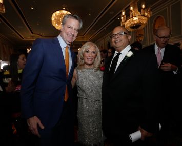 Mayor Bill de Blasio, C&W's Joanne Podell and REBNY President John Banks.
