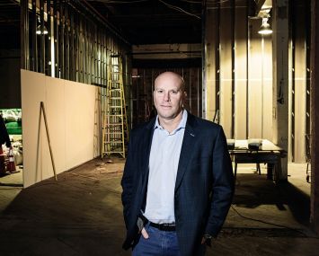 Daren Hornig stands in his development called the Box Factory, near the Bushwick-Ridgewood border.