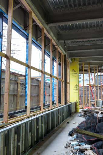 The ground floor space of the development will have a floor-to-ceiling glass corner, which will be occupied by CVS.